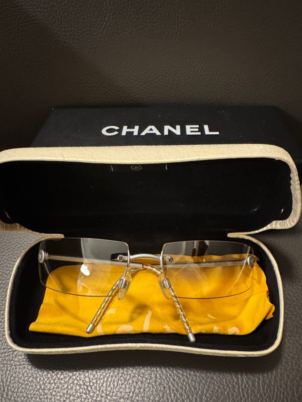CHANEL vintage Rimless Rectangular Sunglasses with Braided Silver Temples